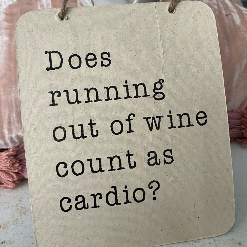 Hanging Sign “Does running out of wine count as cardio?”